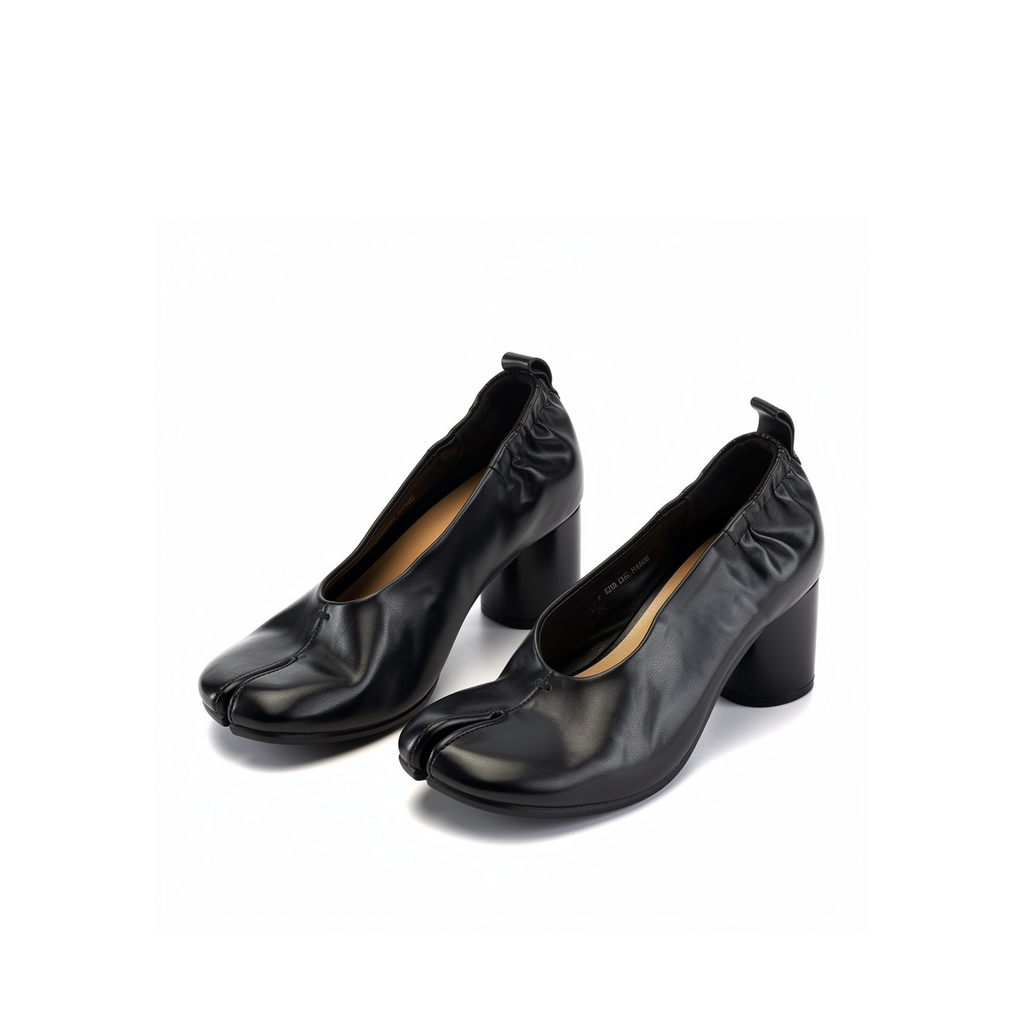 Side profile of Amelora black leather tabi heels showing sculpted heel and split toe