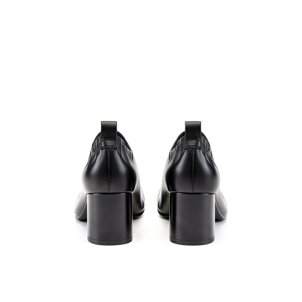 Amelora black leather tabi heels top-down flatlay, dark feminine whimsigoth styling