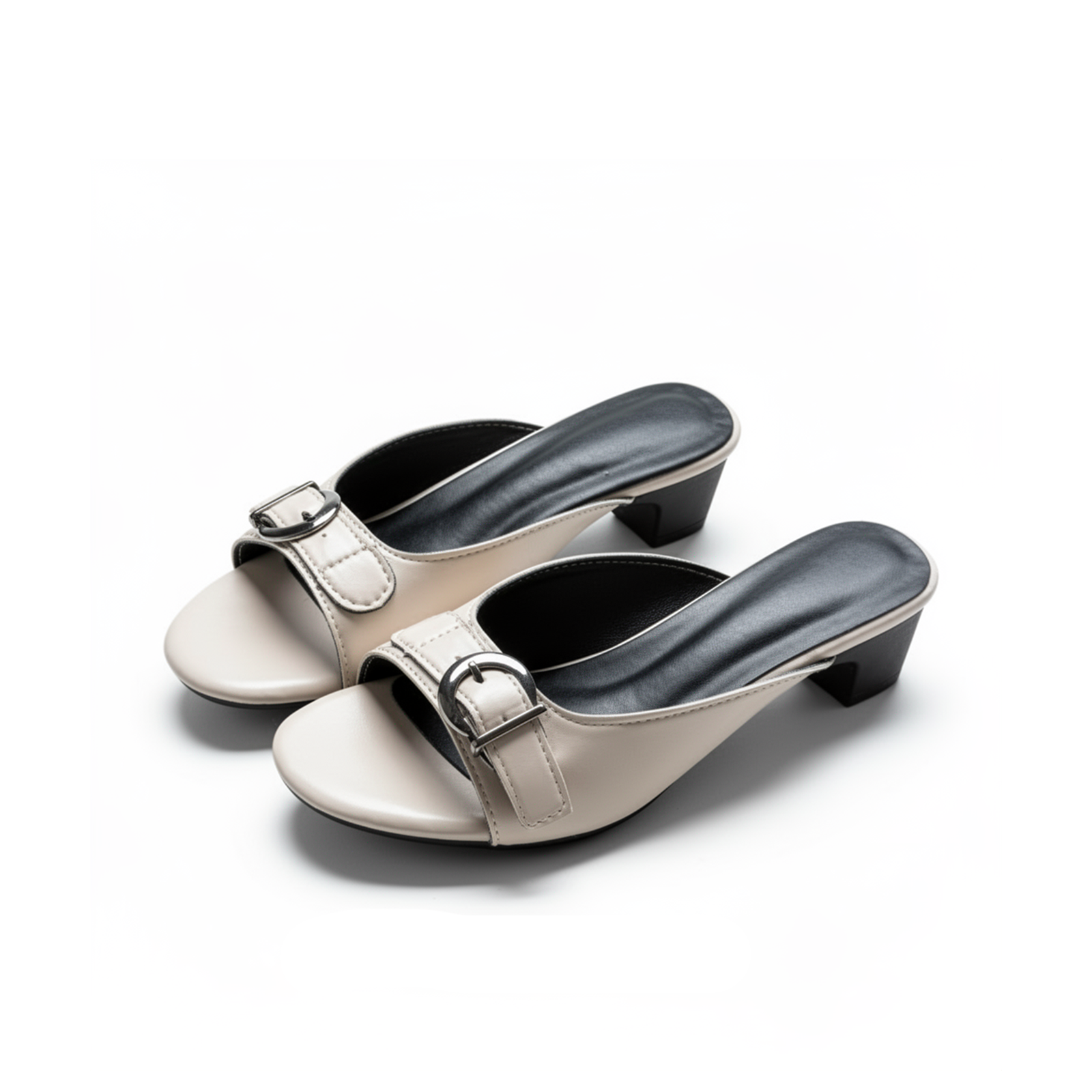 Belvra beige buckle mule heels three-quarter angle view — Lil Cacti