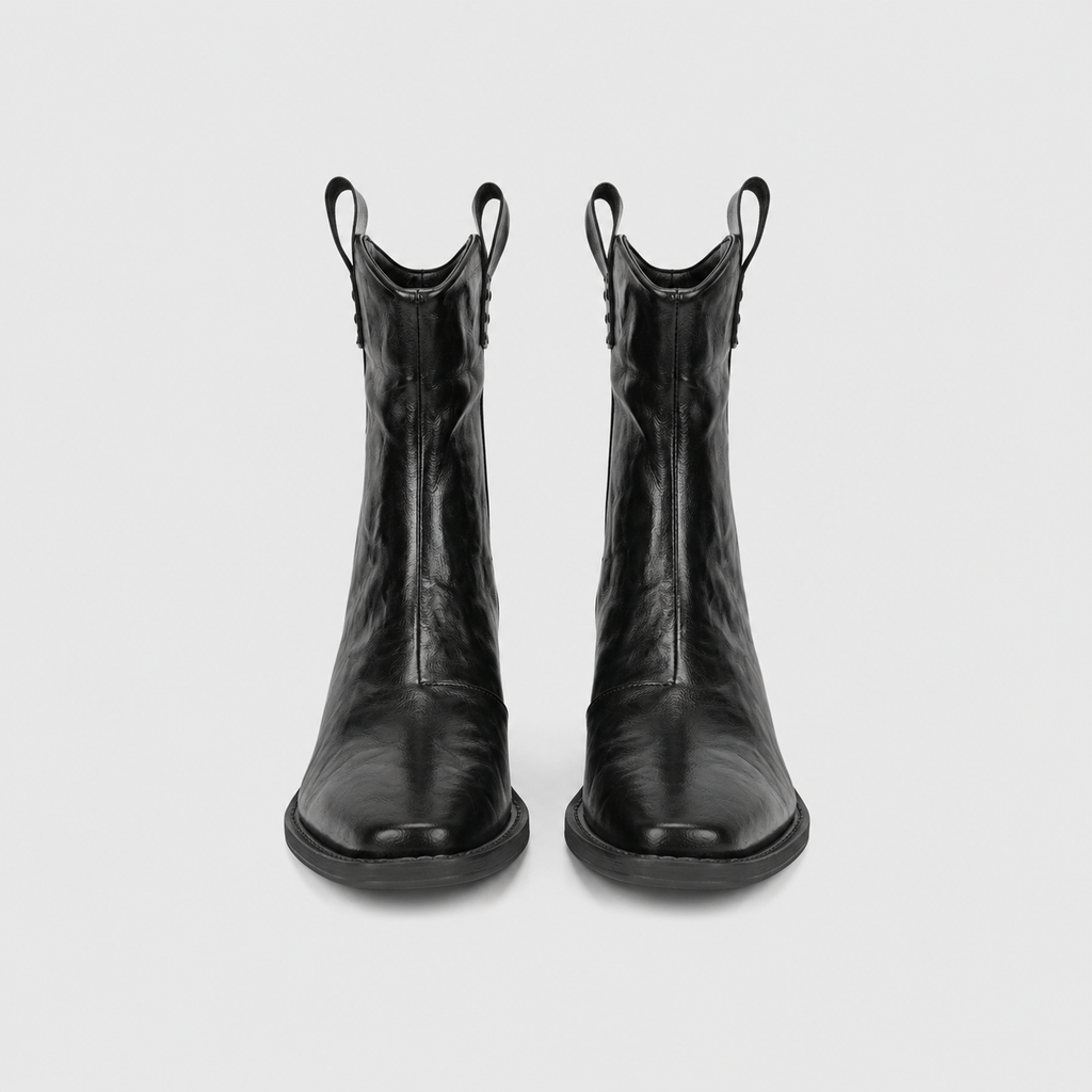 Detail views of the pointed toe, stitched sole edge and back pull tab