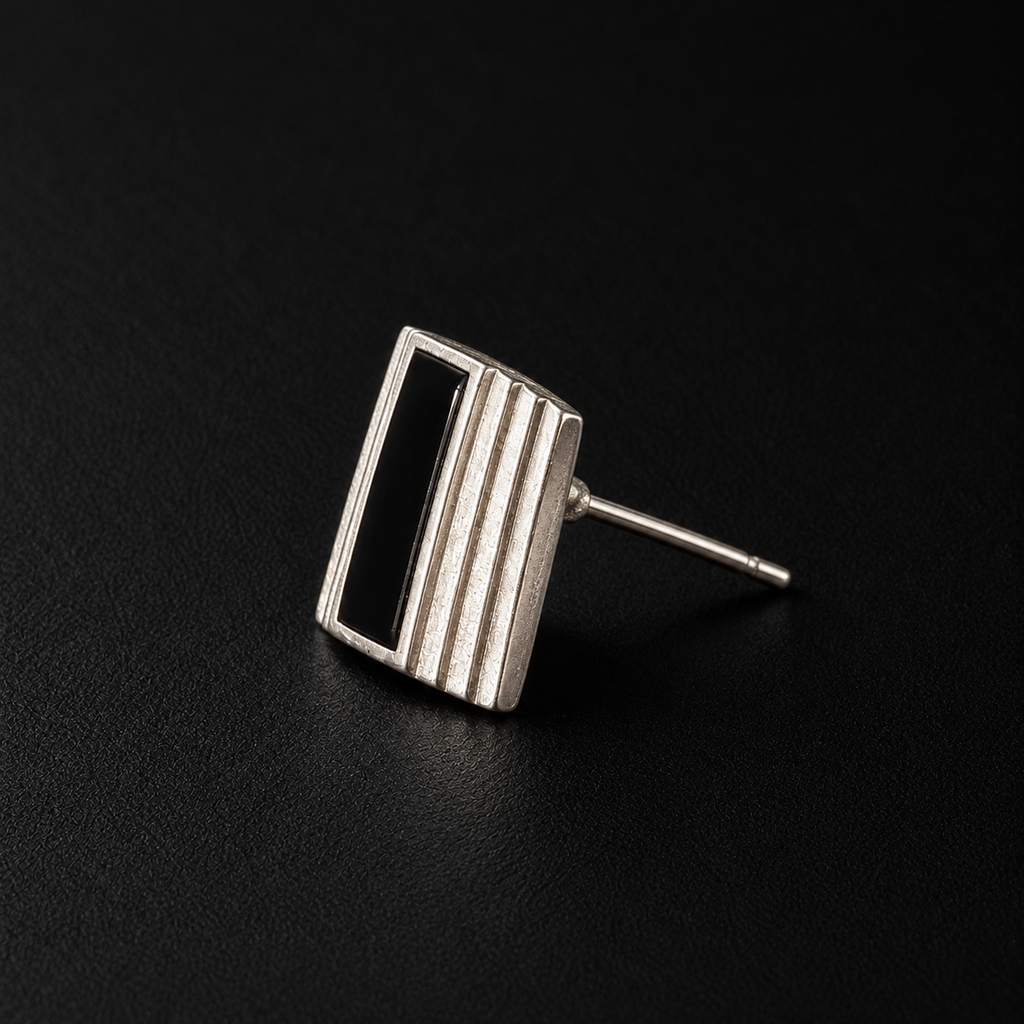 Detail view of the Column Square Stud Earrings