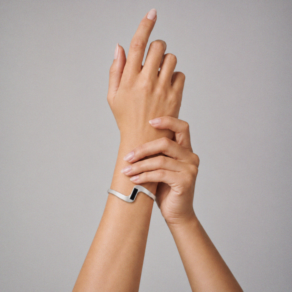 Model wearing Lil Cacti Crest Wave Cuff Bracelet, close crop on the detail