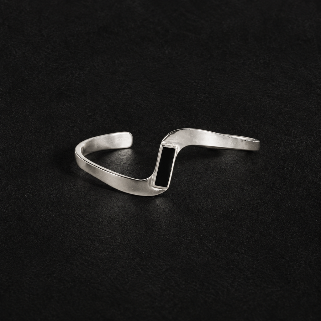 Lil Cacti Crest Wave Cuff Bracelet shown on its own against a dark background