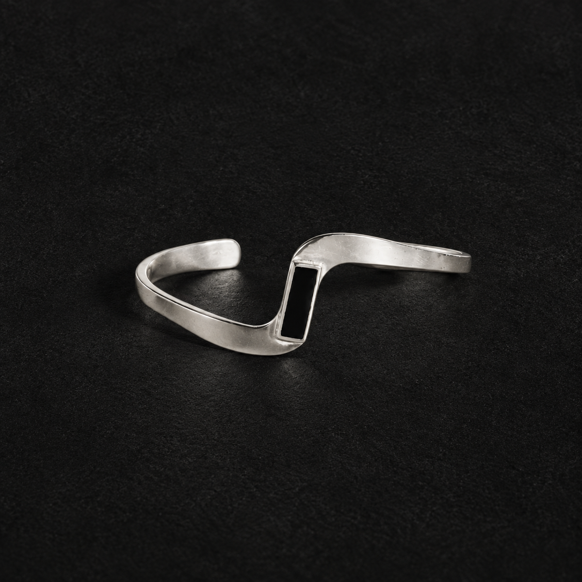 Lil Cacti Crest Wave Cuff Bracelet shown on its own against a dark background