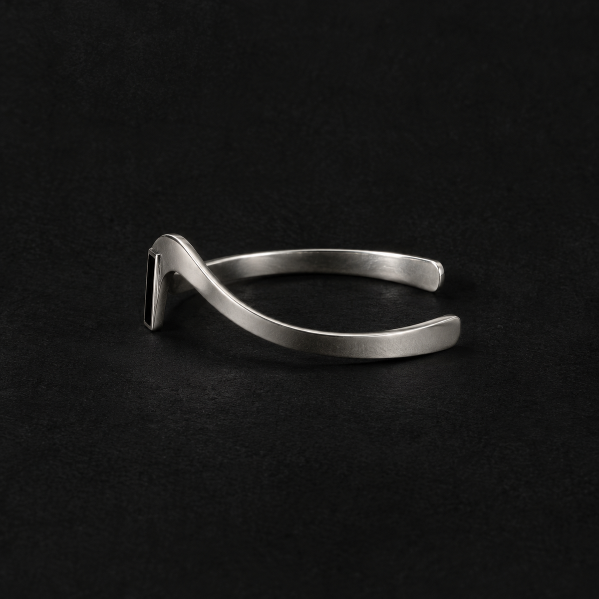 Close detail of the Crest Wave Cuff Bracelet surface and finish