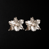 Crushed Orchid Earrings product shot from the side on a plain studio background