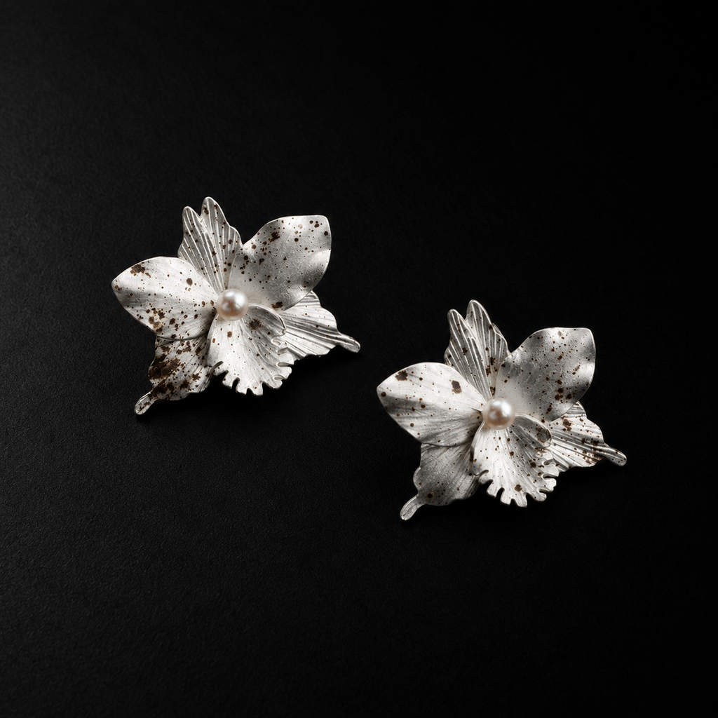 Front view of the Crushed Orchid Earrings in studio light