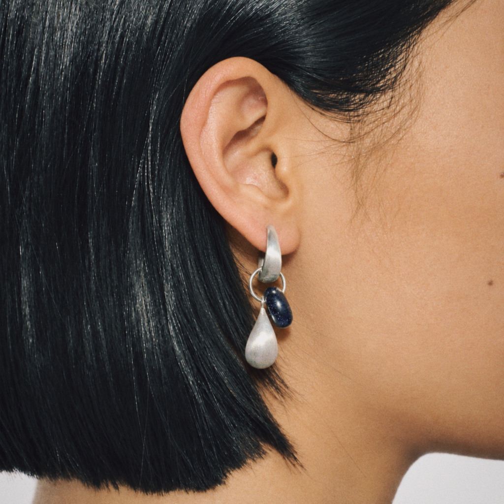 Model wearing Dew Teardrop Charm Hoop Earrings by Lil Cacti, view 3