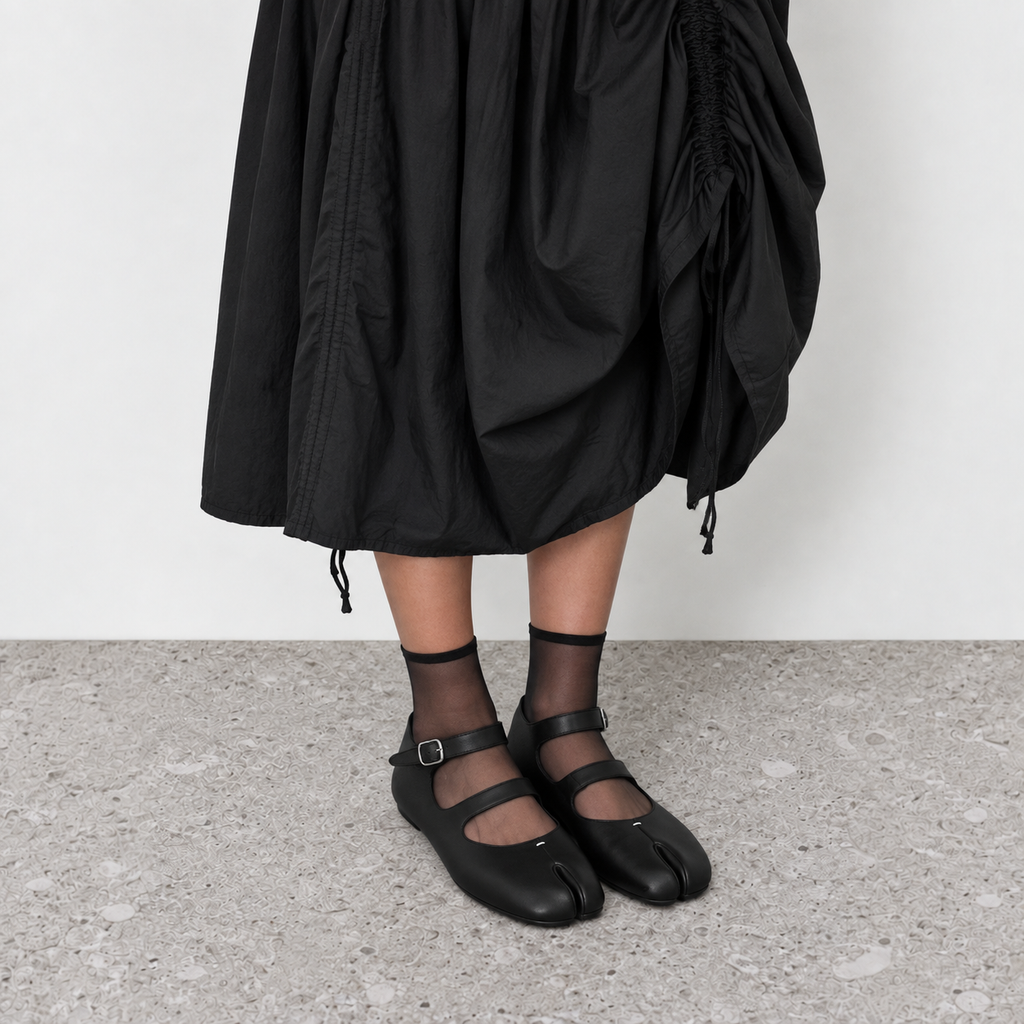 Double Strap Tabi Mary Jane by Lil Cacti — on-model styled with sheer black ankle socks and a black ruched midi skirt