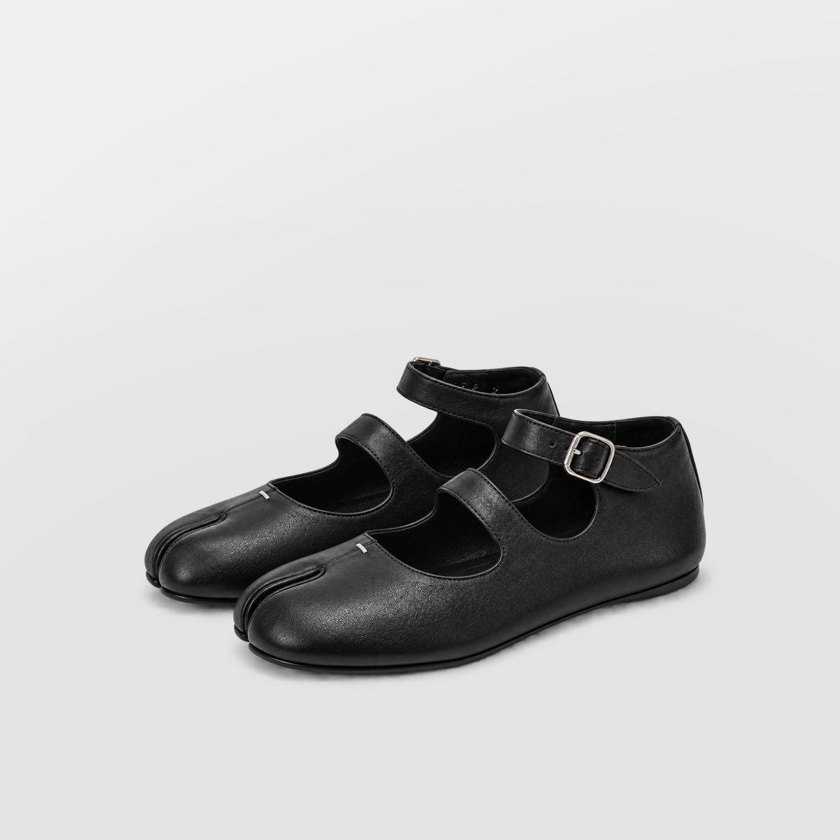Double Strap Tabi Mary Jane by Lil Cacti — three-quarter view of the pair showing split toe and double straps