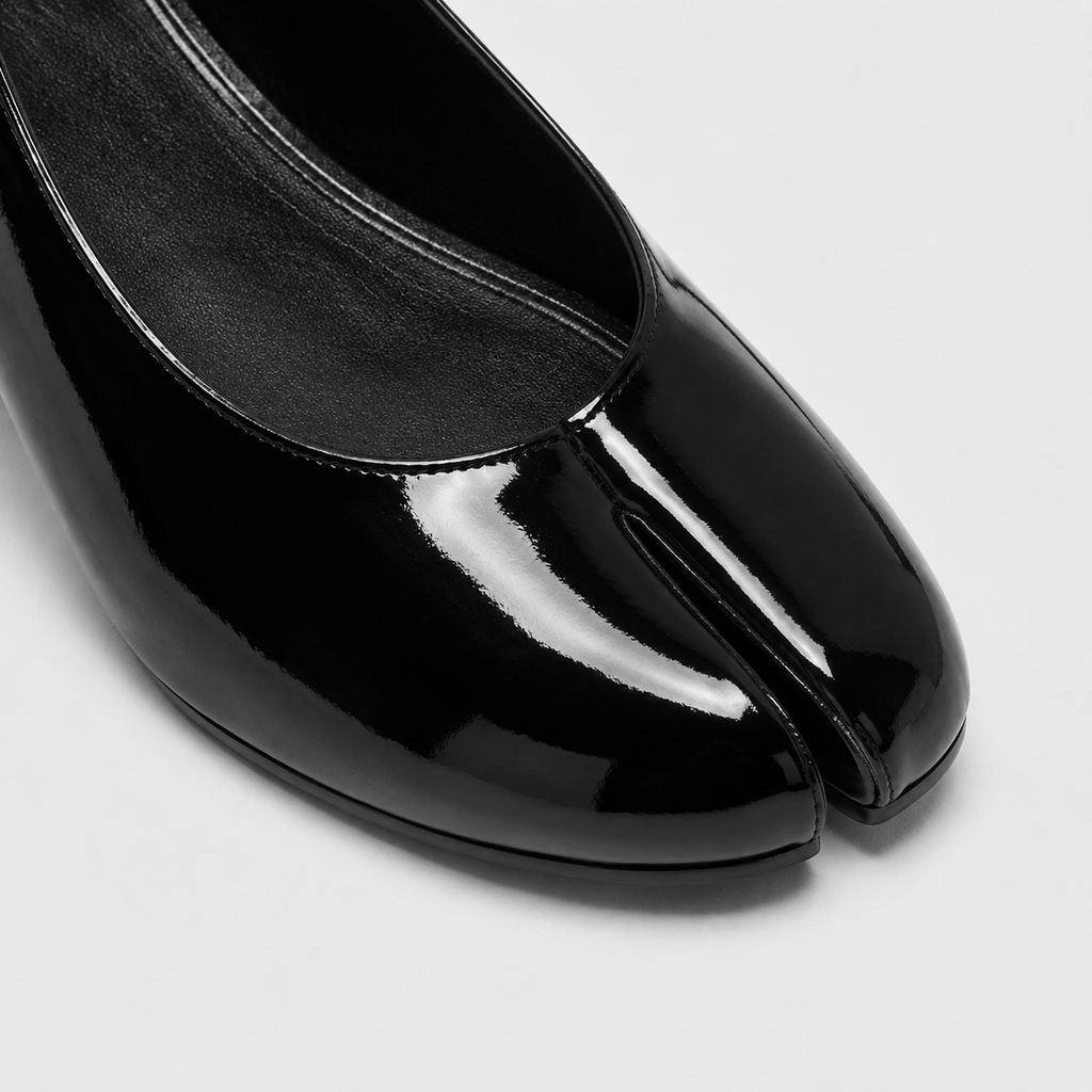 Echo Tabi Flats by Lil Cacti — close-up of the glossy black patent split toe