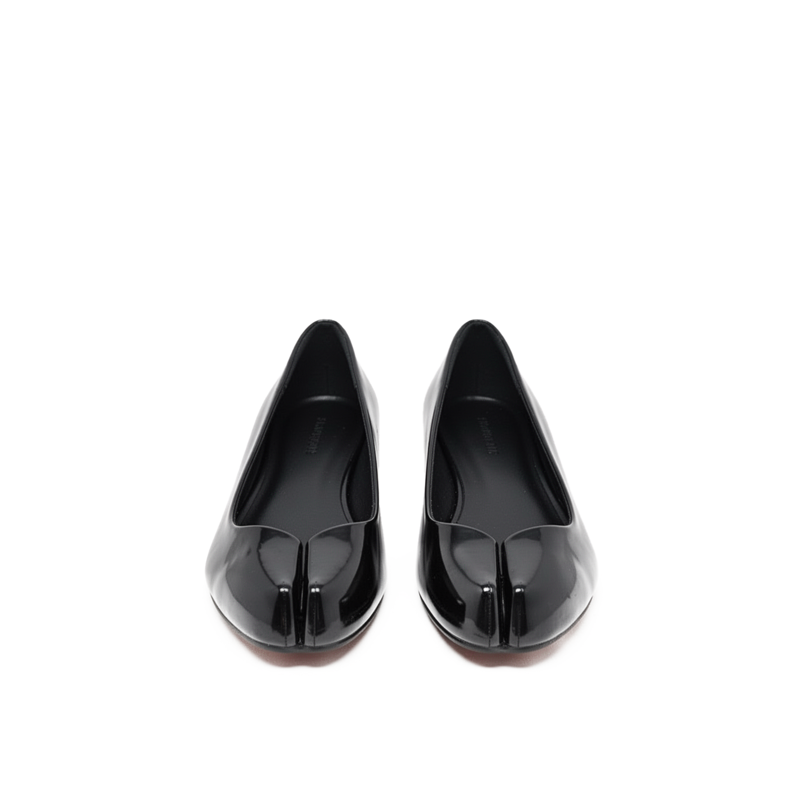 Echo tabi flats close-up — sculptural split-toe detail in black