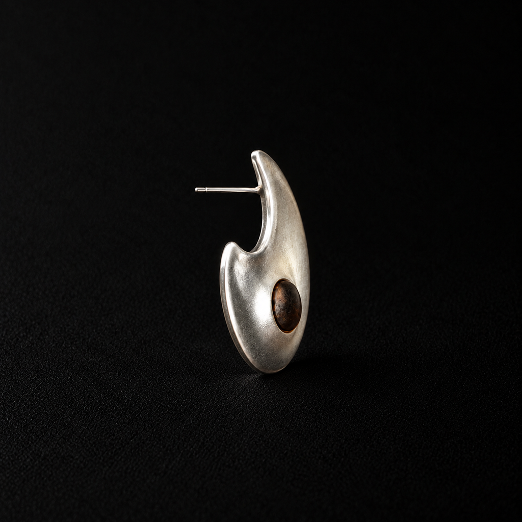 Front view of the Eclipse Crescent Stud Earrings showing the full face