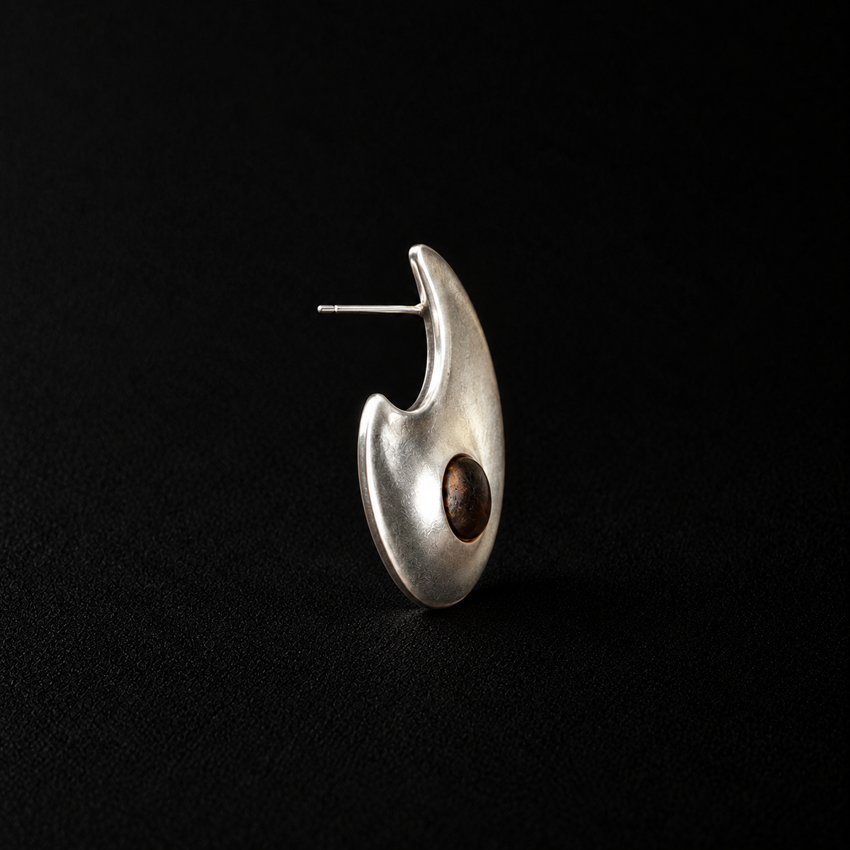 Front view of the Eclipse Crescent Stud Earrings showing the full face