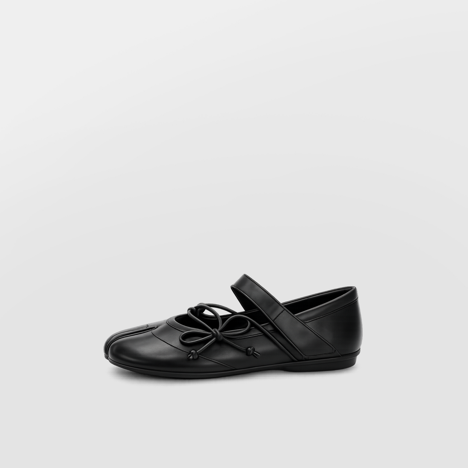 Angled view of Lil Cacti black leather lace-up tabi flats with a soft bow