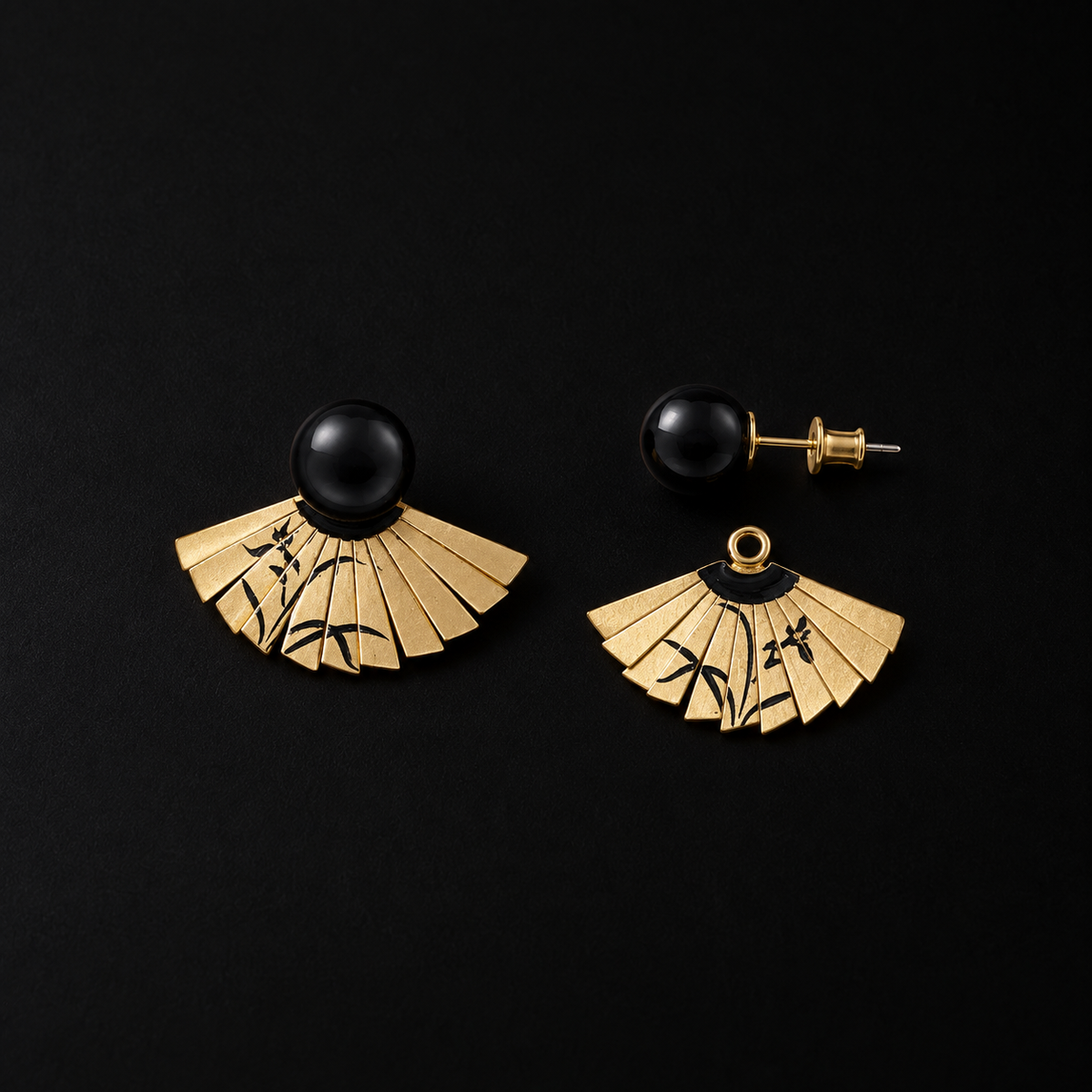 Close detail of the Etched Fan Drop Earrings by Lil Cacti