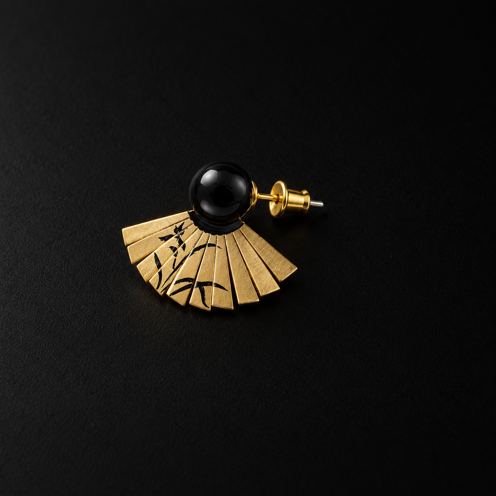 Close detail of the Etched Fan Drop Earrings by Lil Cacti
