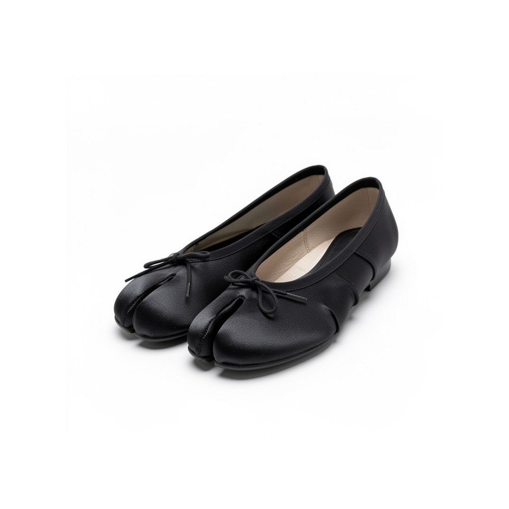 Side profile of Evelyne black satin tabi ballet flats showing flat sole and split toe