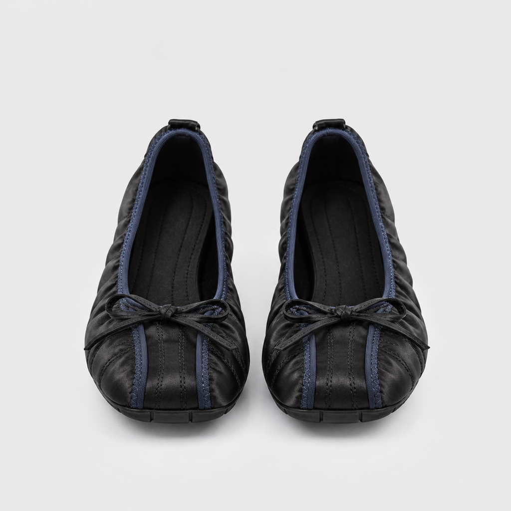 Front view of both Faye Ruched Bow Ballet Flats in black, showing toe shape