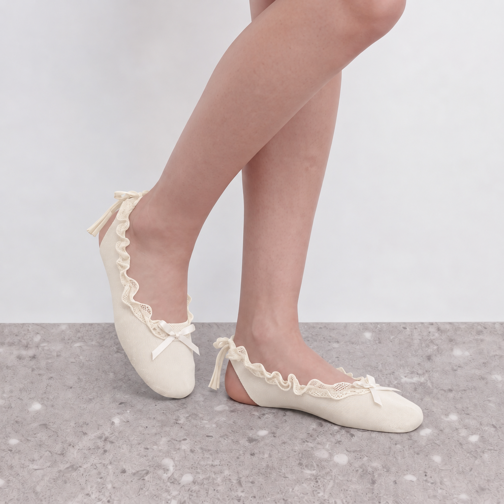 Giselle Ruffle Ballet Socks by Lil Cacti in cream, seated pose with bows