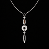 Halo Drop Collar Necklace shown at a three quarter angle in studio light