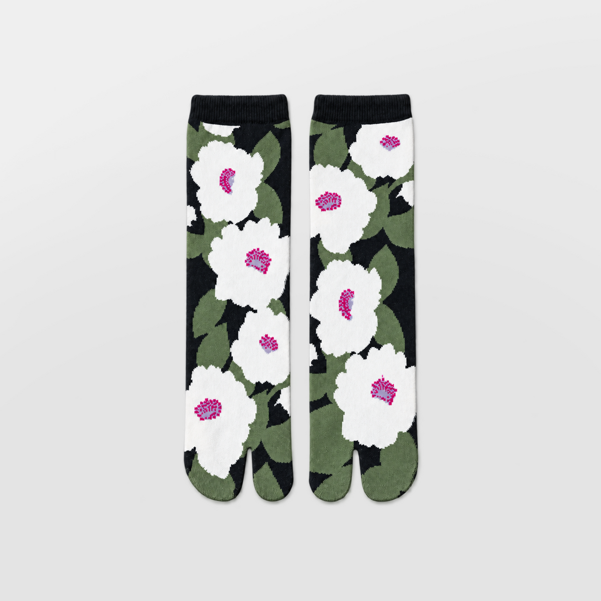 green floral print tabi socks laid flat showing the split toe