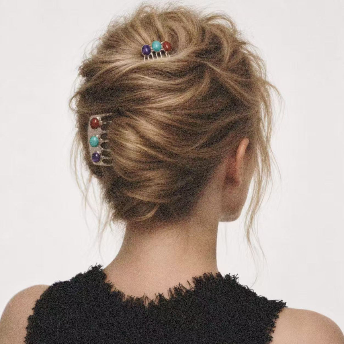 Model wearing the Jewelled Hair Comb seen from behind