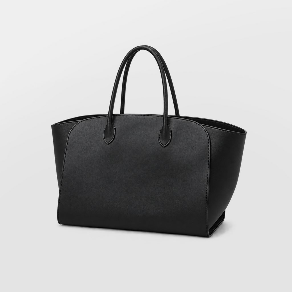 Black leather tote photographed standing to show the soft unstructured shape