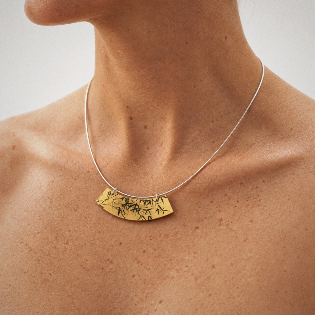 Wire choker from Lil Cacti: the Lacquer Bamboo Collar Necklace shown from the side