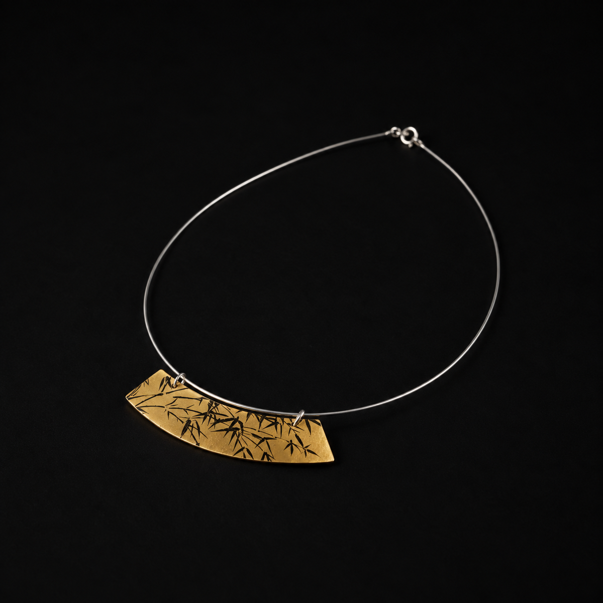 The Lacquer Bamboo Collar Necklace laid flat, a collar necklace in full view