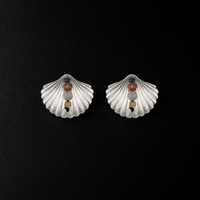Lil Cacti seashell stud earrings showing shape and finish on dark background