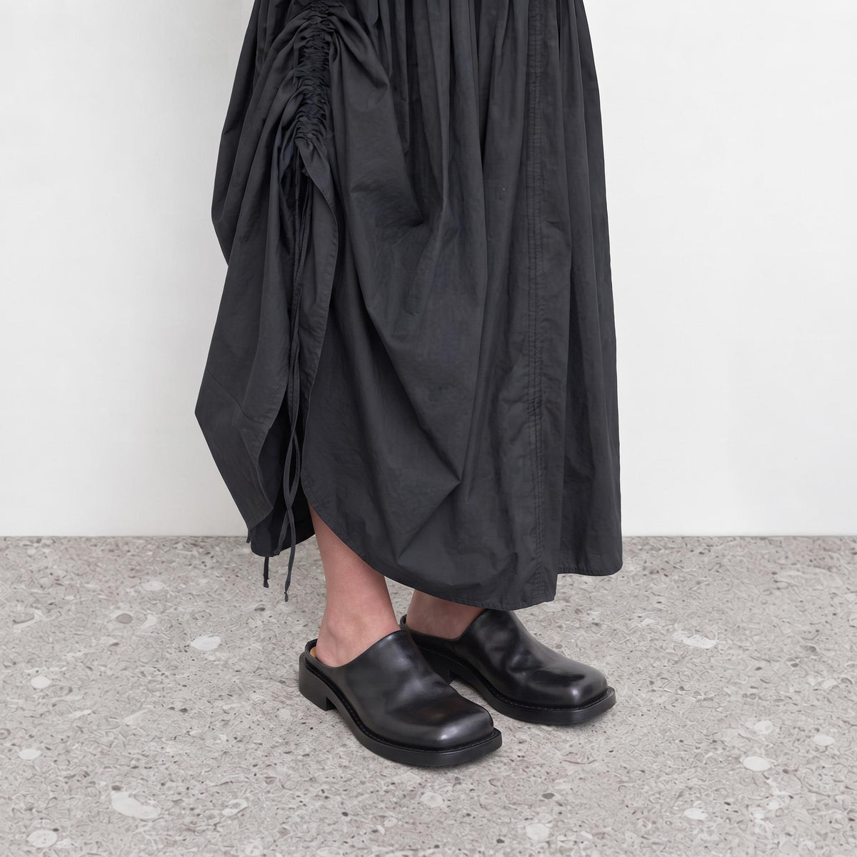 Model wearing Marlowe Square-Toe Mules by Lil Cacti, view 2