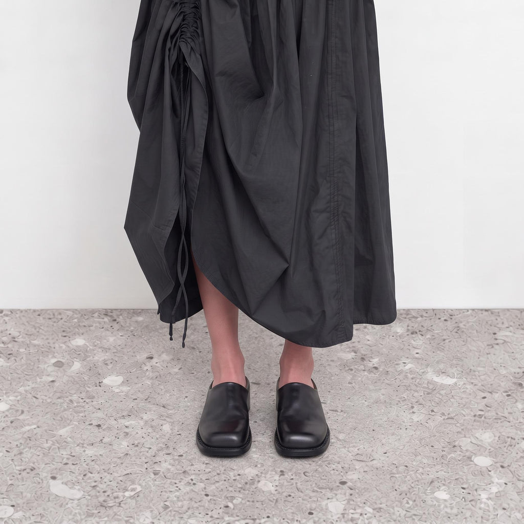 Model wearing Marlowe Square-Toe Mules by Lil Cacti, view 3