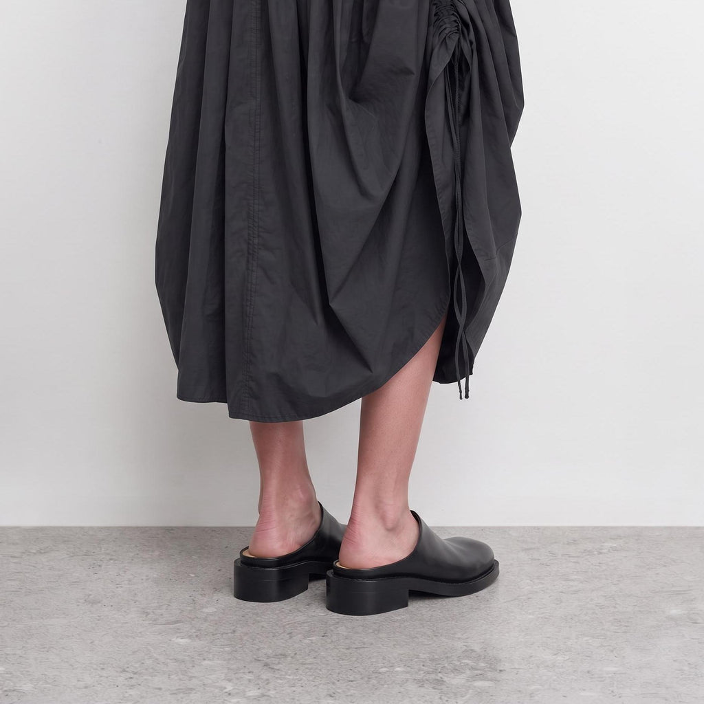 Model wearing Marlowe Square-Toe Mules by Lil Cacti, view 4
