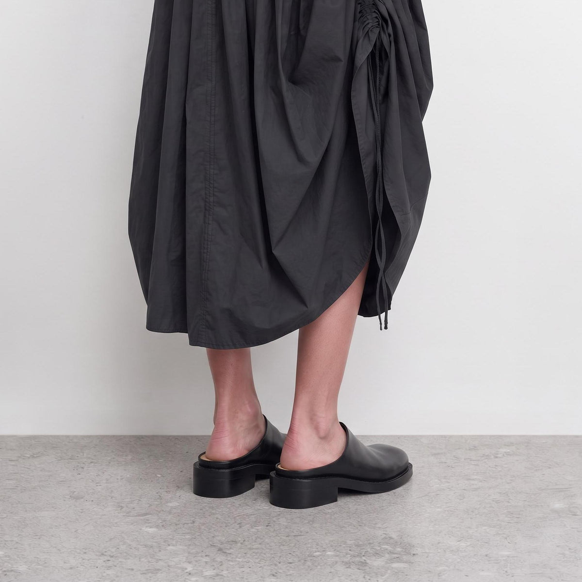 Model wearing Marlowe Square-Toe Mules by Lil Cacti, view 4