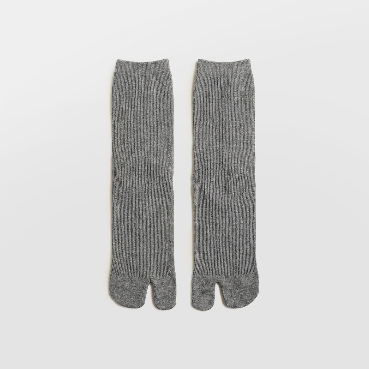 Mid Calf Tabi Socks by Lil Cacti — heather gray ribbed knit pair laid flat side by side, split toe visible