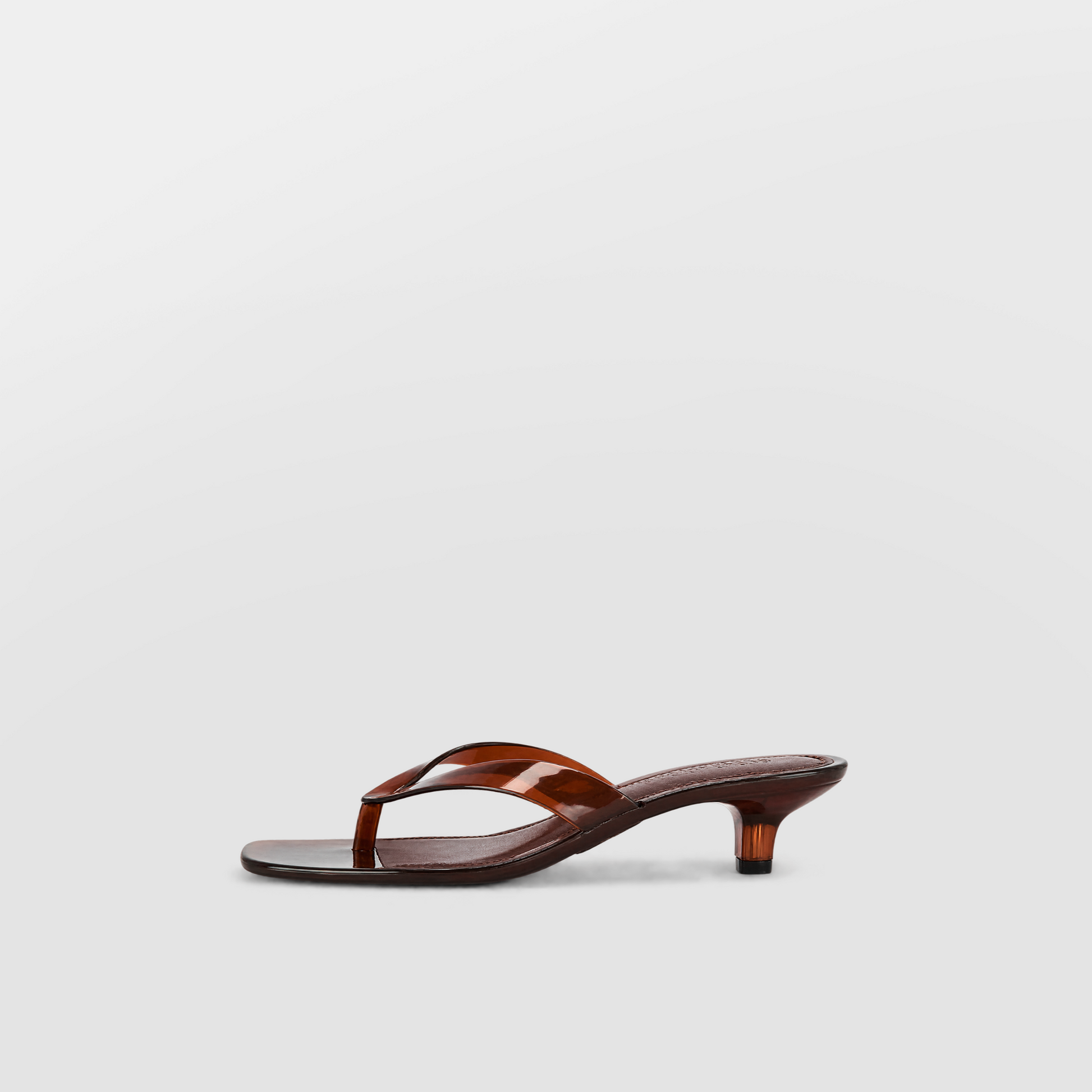 Mirage Thong Sandals by Lil Cacti — side profile in brown, translucent amber thong strap, square toe and low kitten heel