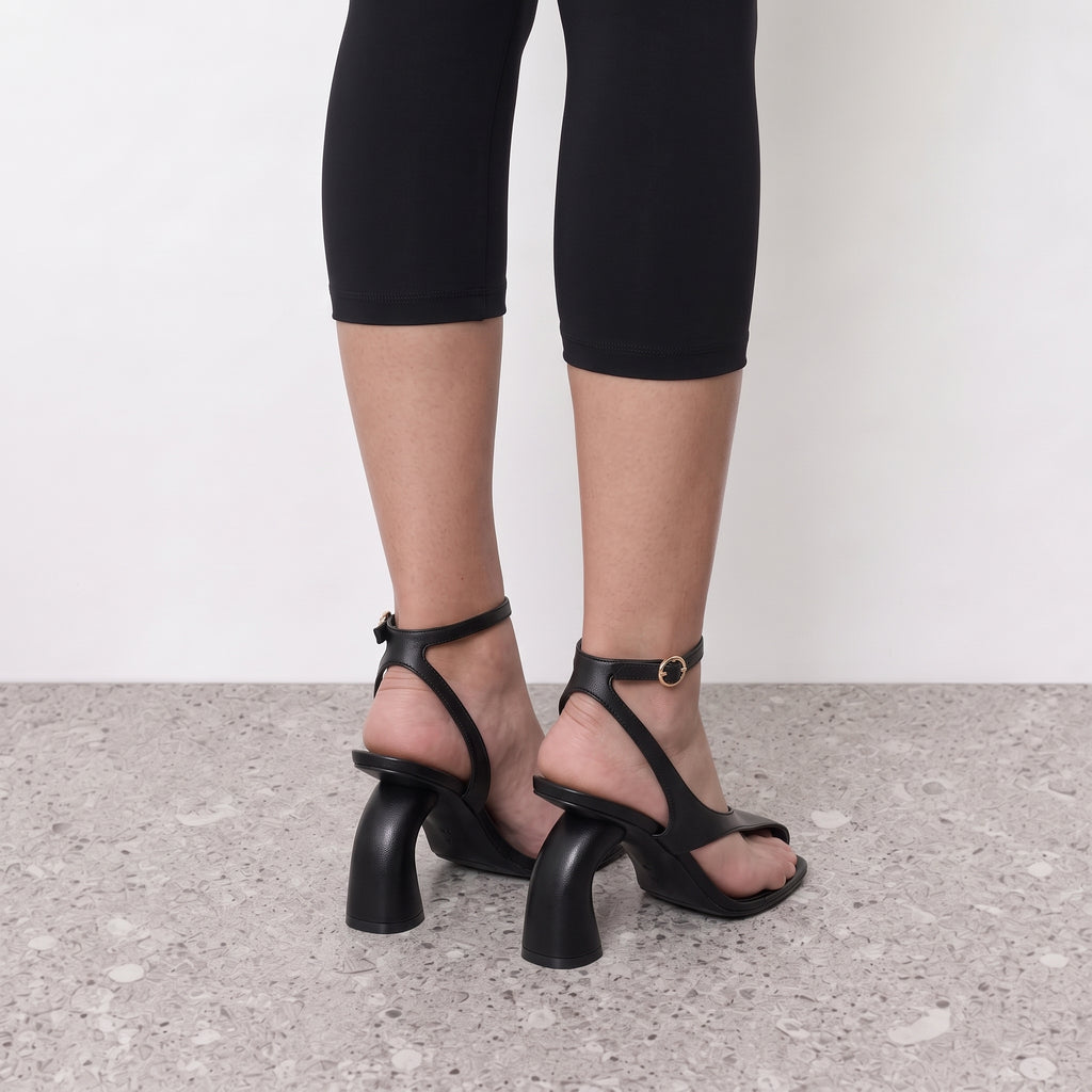 Model standing in Lil Cacti Nerissa slingback sandal heels