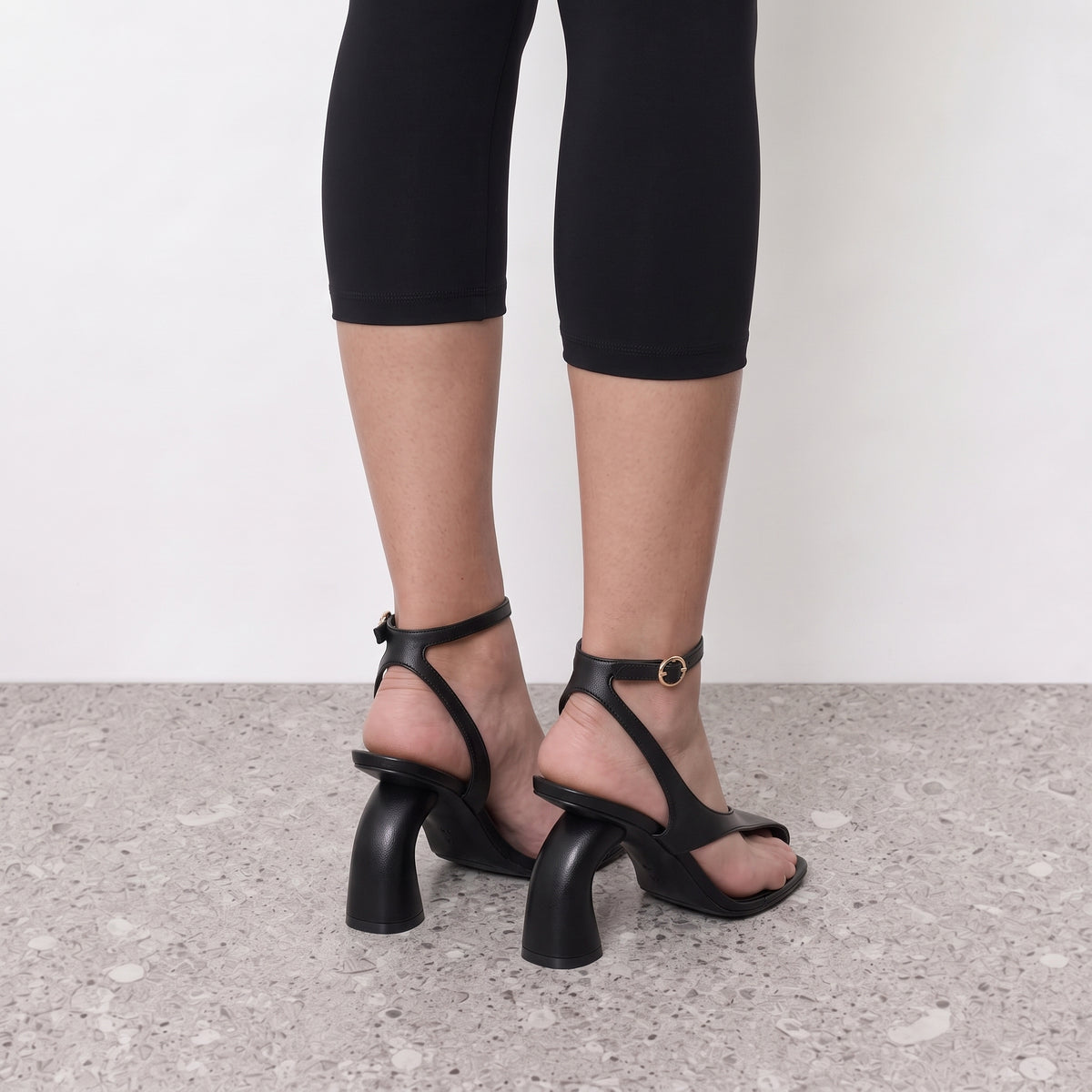 Model standing in Lil Cacti Nerissa slingback sandal heels
