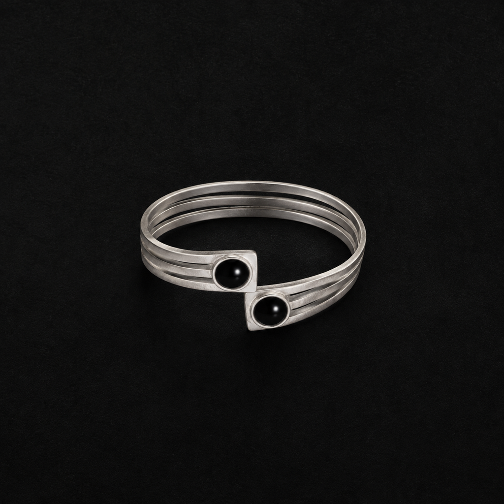 Lil Cacti black onyx-look cuff bracelet showing shape and finish on dark background