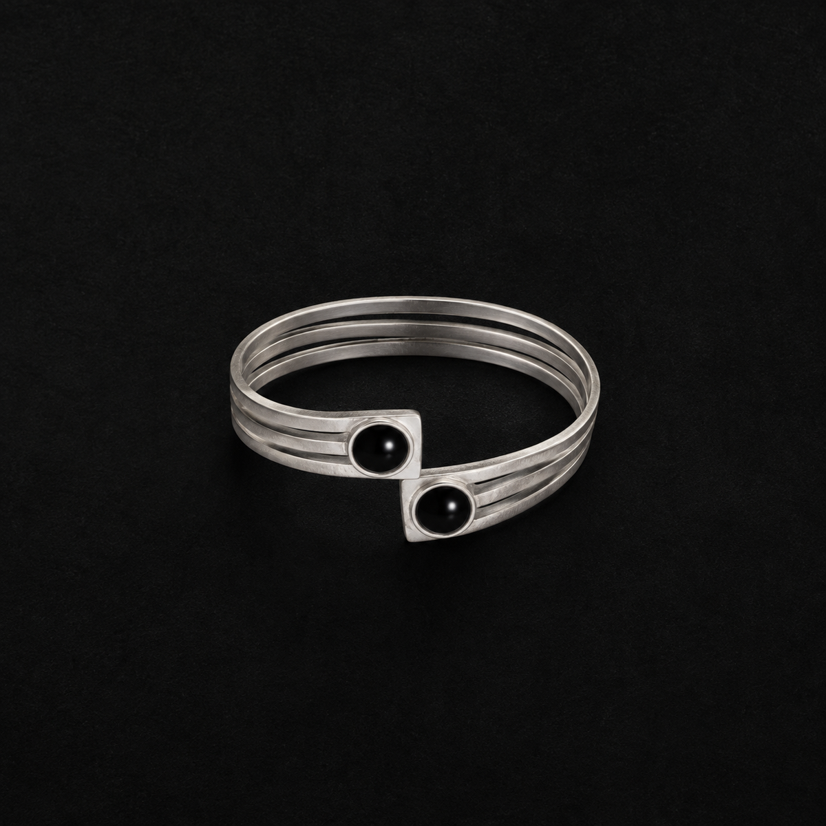 Lil Cacti black onyx-look cuff bracelet showing shape and finish on dark background