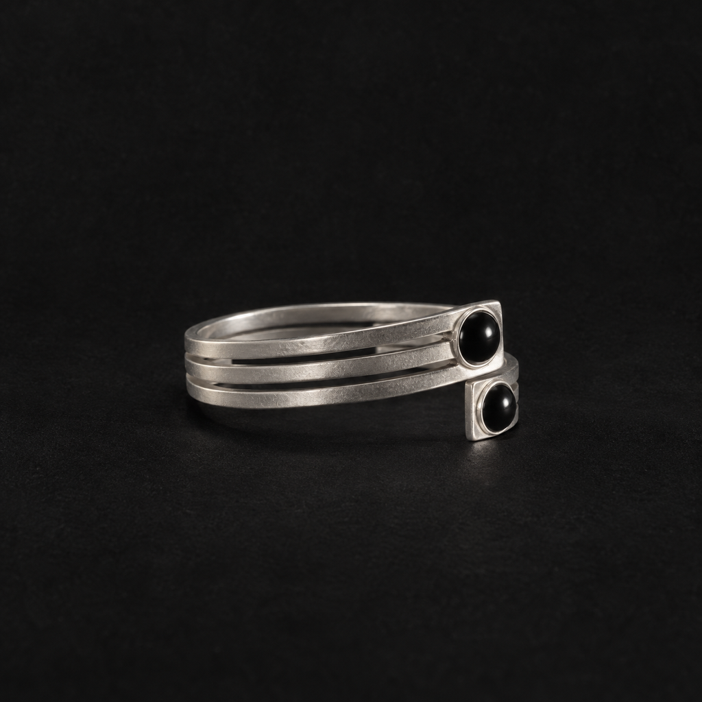 Lil Cacti black onyx-look cuff bracelet showing shape and finish on dark background