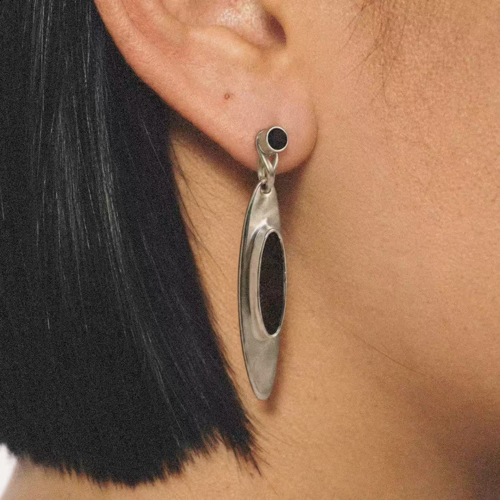 Model wearing the Oval Stone Drop Earrings seen from behind by Lil Cacti