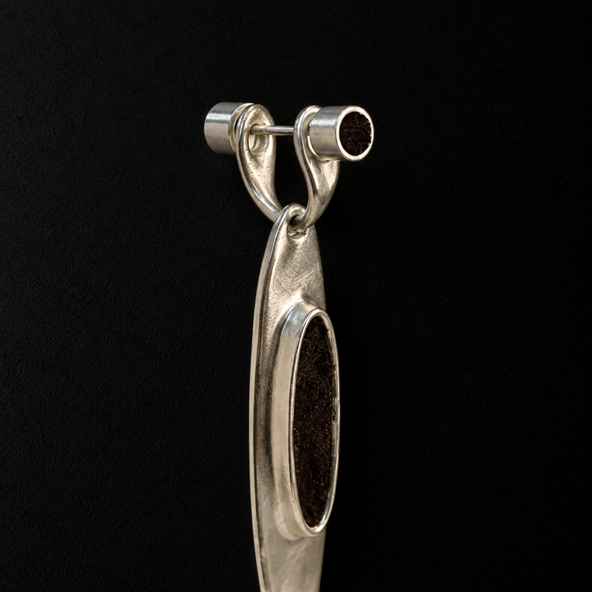 Back view of the Oval Stone Drop Earrings in studio light
