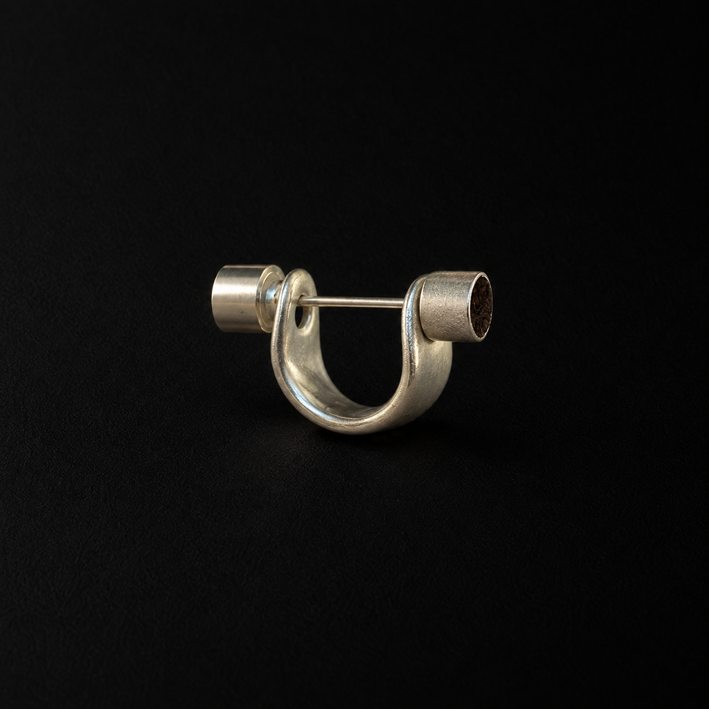 Close detail of the Pebble Disc Huggie Earrings by Lil Cacti