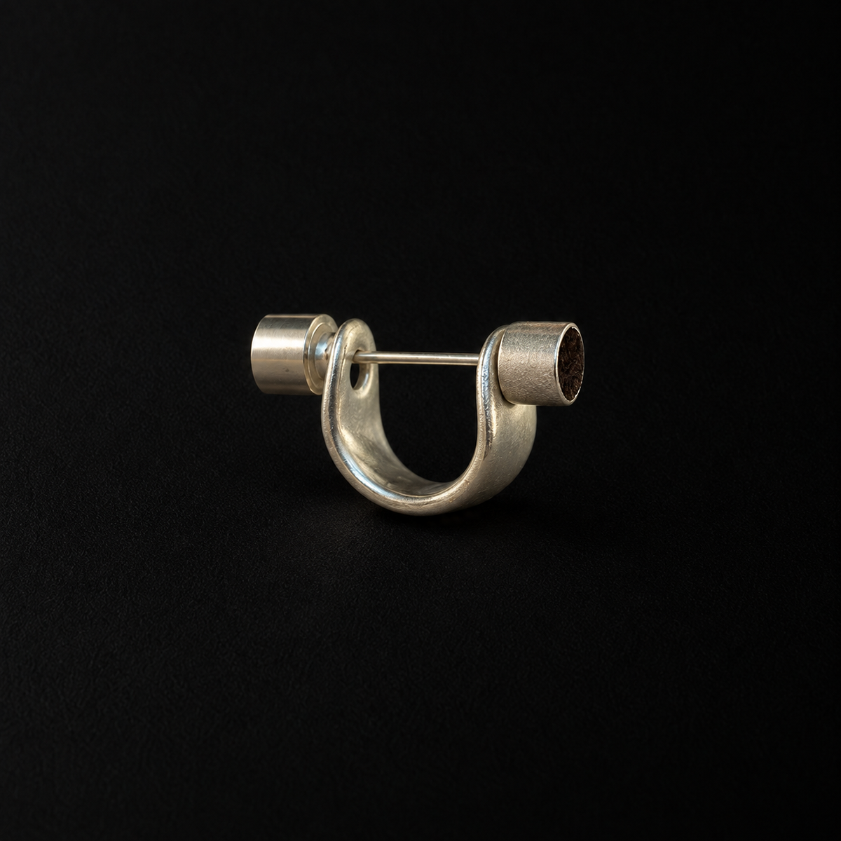 Close detail of the Pebble Disc Huggie Earrings by Lil Cacti