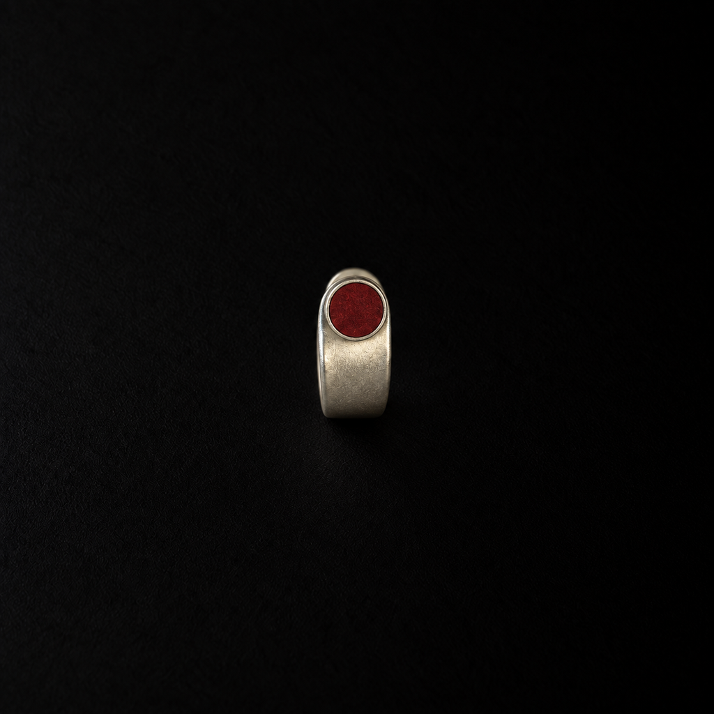 Close detail of the Pebble Disc Huggie Earrings by Lil Cacti