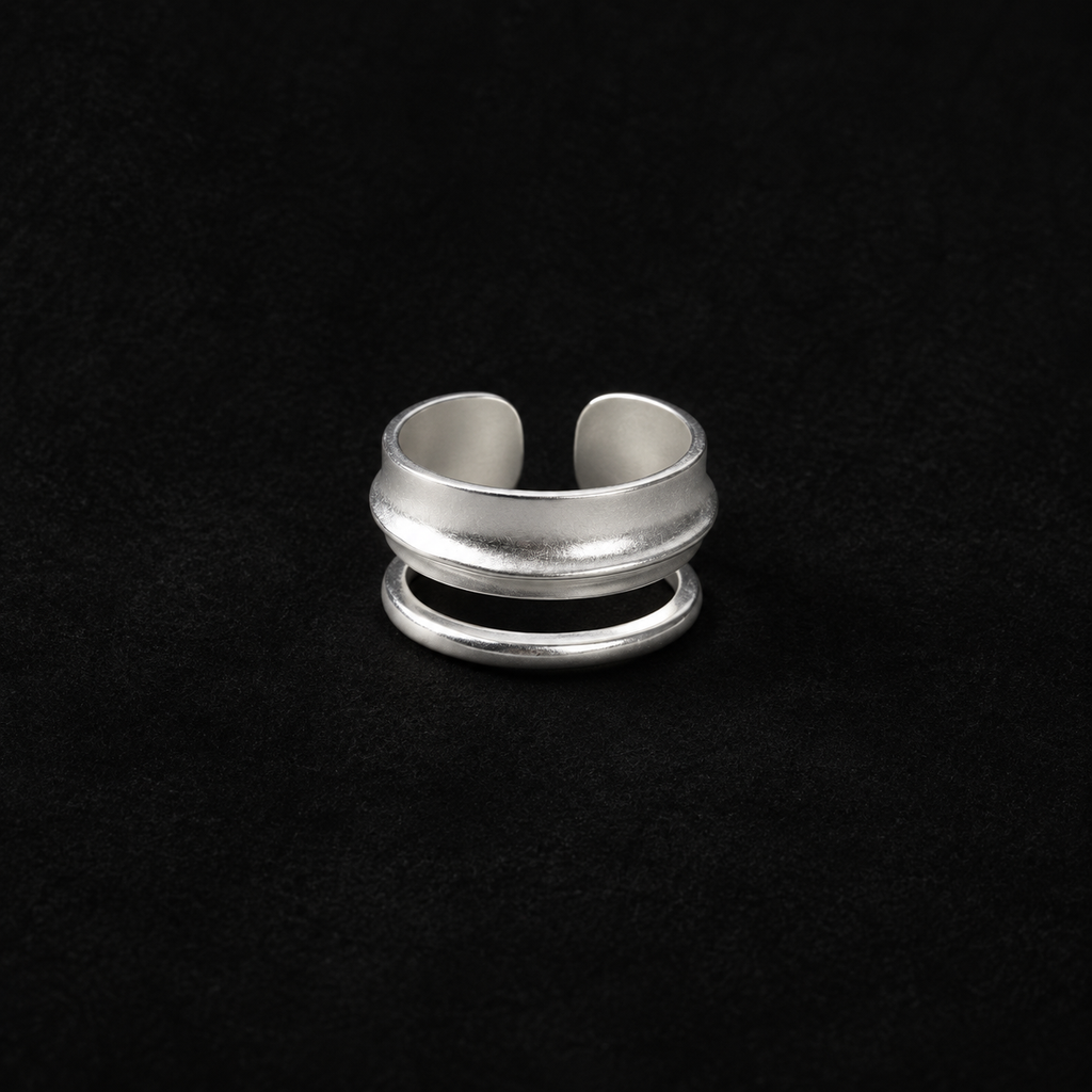 Ripple Band Ring product shot from the side on a plain studio background
