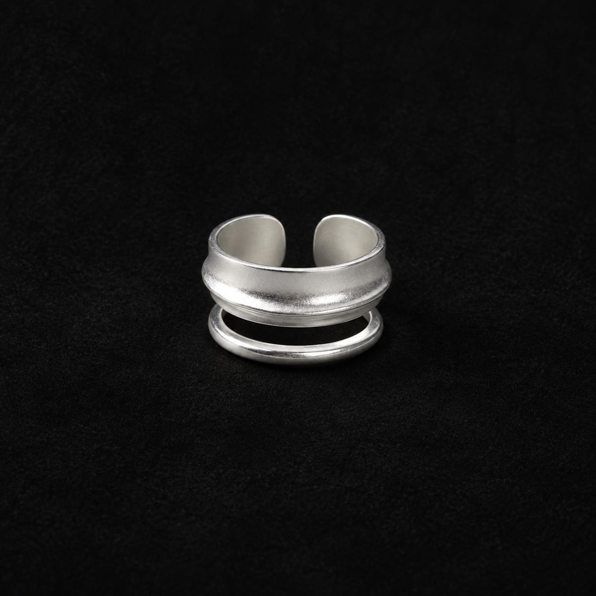 Ripple Band Ring product shot from the side on a plain studio background