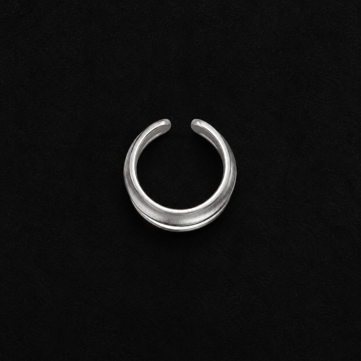 Front view of the Ripple Band Ring in studio light